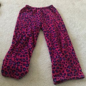 Fuzzy pink and purple children’s pajama pants